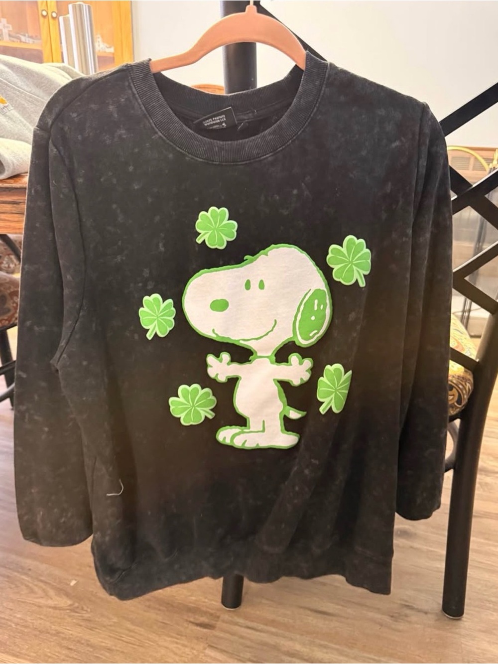 Womens Black Snoopy Graphic Long-Sleeve Shirt with Green Clover Accents